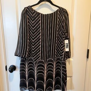 NWT!!  Dress T brand. Lightweight patterned dress. Size 6